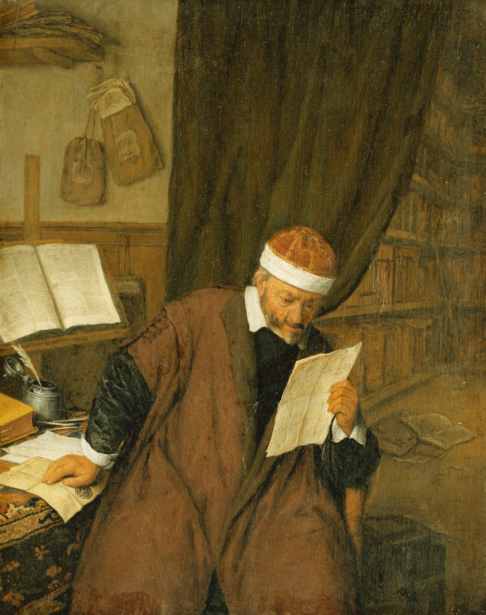Egy ügyvéd az íróasztalnál ül, levelet olvas, a könyvtáron túl, 1668 alkotó: Adriaen Jansz. van Ostade