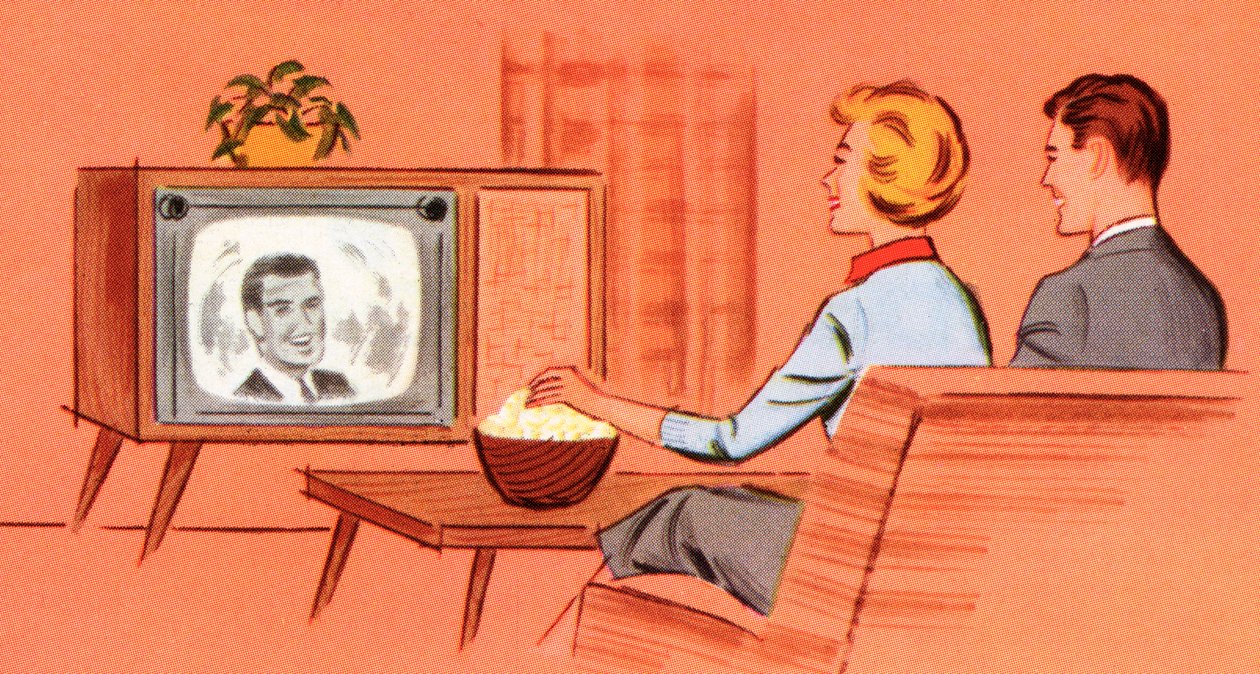 Pár nézi a retro televíziót az odújukban alkotó: American School