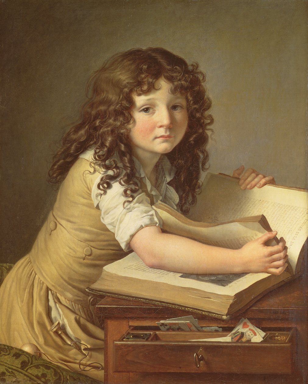 Egy gyermek nézi a képeket egy könyvben alkotó: Anne Louis Girodet de Roucy Trioson