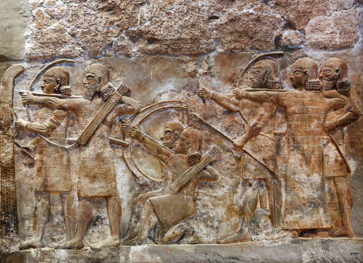 Az asszír hadsereg íjászok meghódítanak egy megerősített várost, dombormű Nimrudból, ie 865 körül alkotó: Assyrian