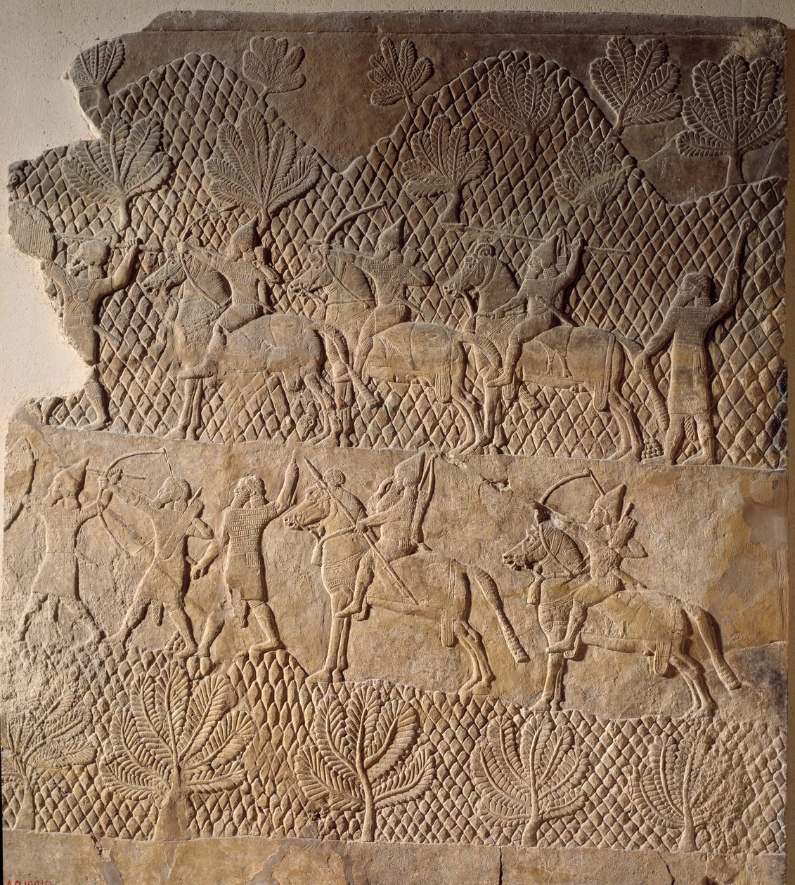 Az ókor keleti művészete: csatajelenet. Alacsony dombormű az Assurbanipal-palota, Asszíria (Kr. e. 7. század). Párizs, Louvre Múzeum alkotó: Assyrian