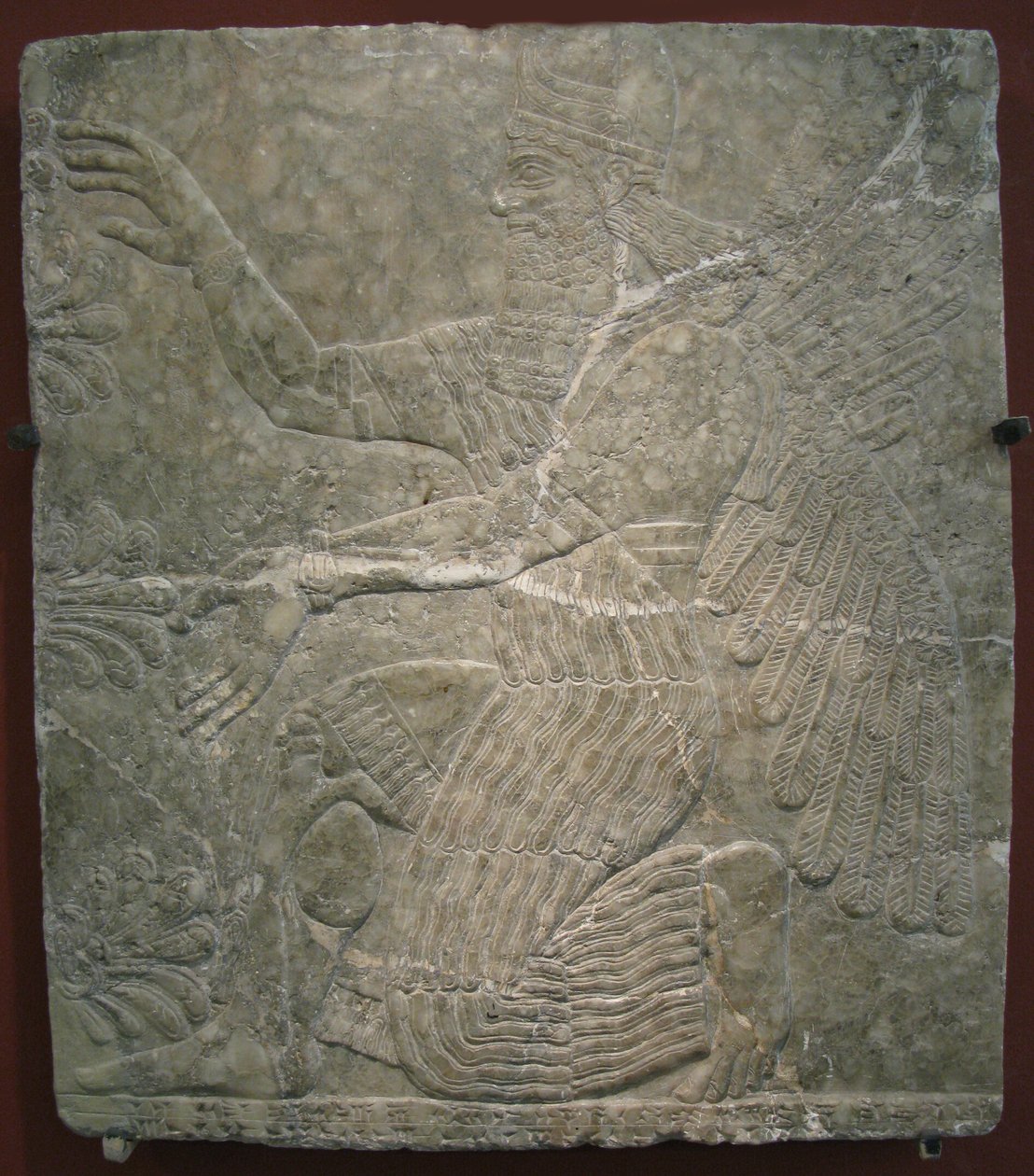 Szárnyas istenség a szent fa mellett. Dombormű II. Assurnasirpal palotájából Kalhuban, Nimrudban, ie 9. század alkotó: Assyrian