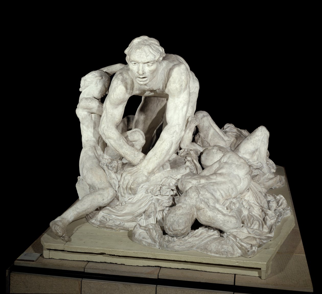 Ugolin Ugolin (Gróf Ugolino della Gherardesca), pisai zsarnok, a haza árulója, négy gyermekével körülvéve. A pokolban megidézett karakter Dante Alighieri (1265-1321) „Az isteni színjáték” (La Divina Commedia) című művében. Auguste Rod szobra alkotó: Auguste Rodin