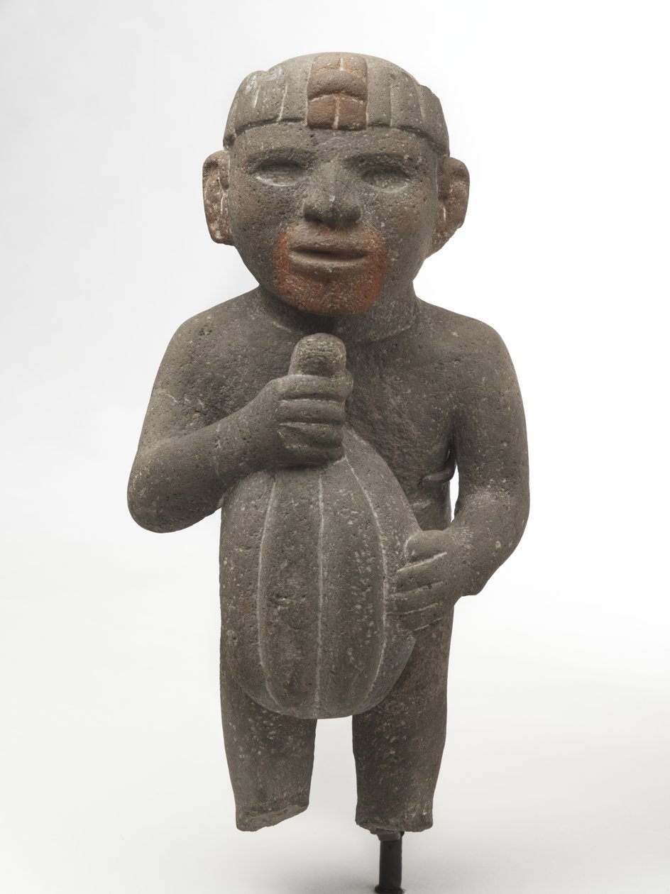 Férfi kakaóhüvelyt hordozó, 1440-1521 (vulkáni kő vörös pigment nyomokkal) alkotó: Aztec