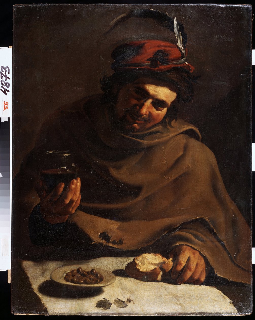 Reggeli (reggeli). Bartolomeo Manfredi (1587-1622) festménye. Olajfestmény. Olasz művészet, barokk stílus. Állami Művészeti Múzeum, Harkov vagy Harkov, Ukrajna. alkotó: Bartolomeo Manfredi