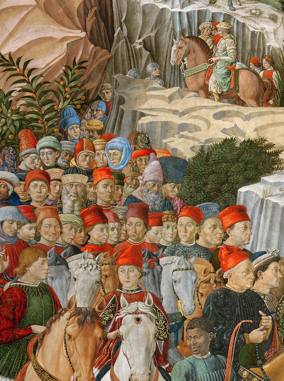 Arcok a körmenetben, köztük Gozzoli önarcképe (piros sapkát visel, arany felirattal: Opus Benotii), részlet a kápolnában a Mágusok utazása ciklusból, 1460 körül (d) alkotó: Benozzo di Lese di Sandro Gozzoli