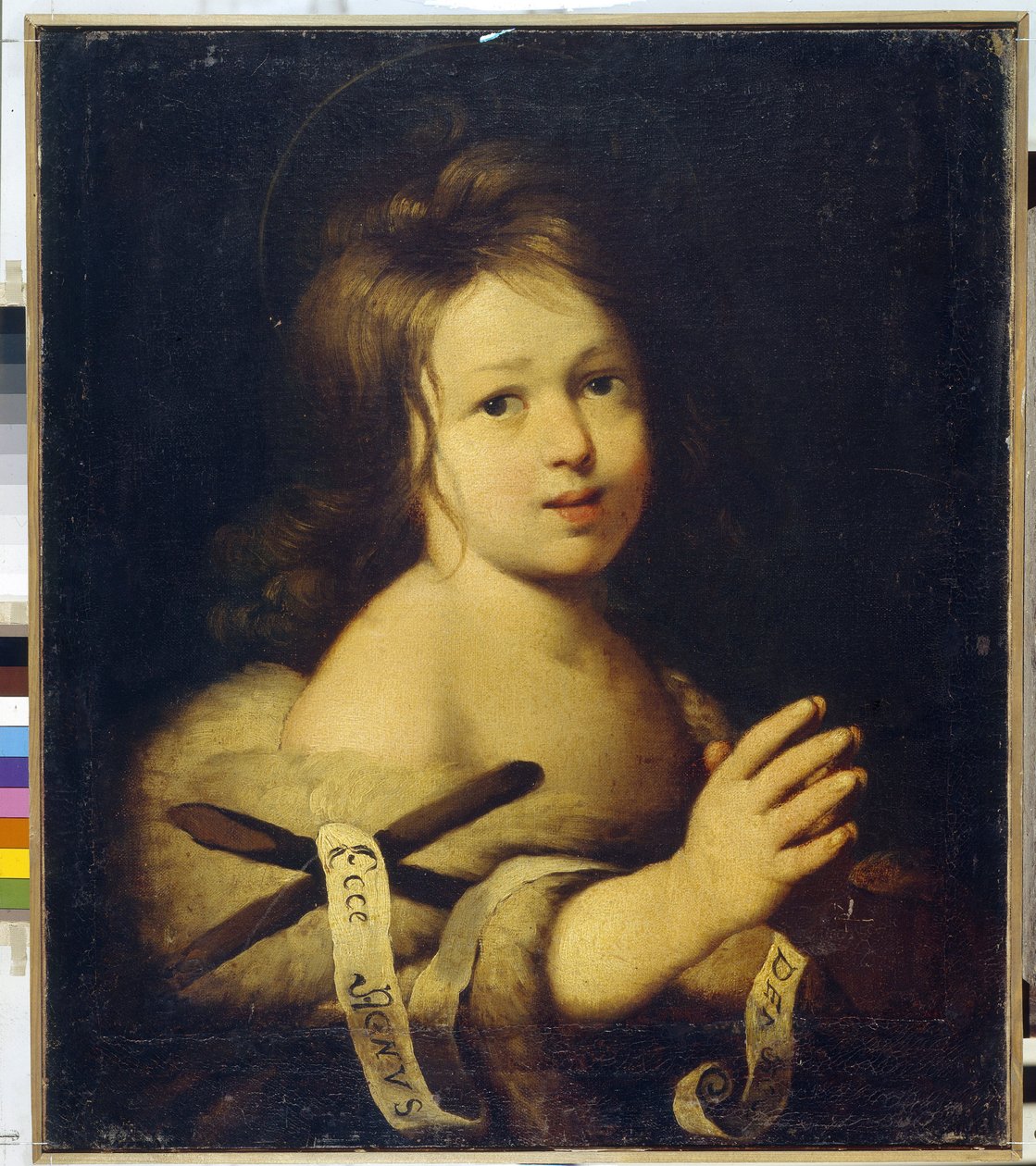 Keresztelő Szent János, gyermek. (Keresztelő János, gyermekként). Kezében egy keresztet tart egy filaktéria "Ecce agnus dei" (Íme, Isten báránya). Bernardo Strozzi (1581-1644) festménye, olaj, vászon alkotó: Bernardo Strozzi