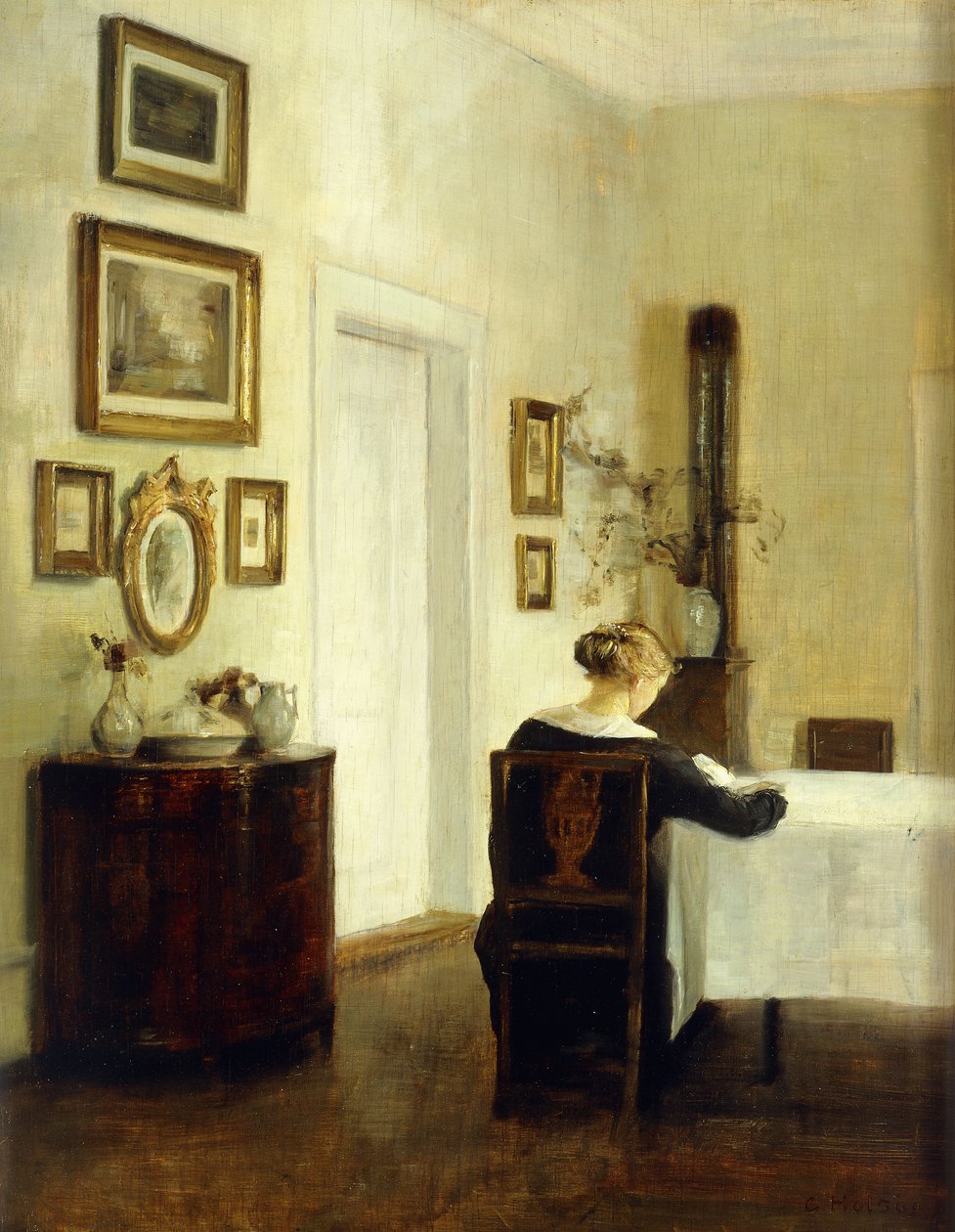 Egy nő egy asztalnál egy belső térben alkotó: Carl Holsoe