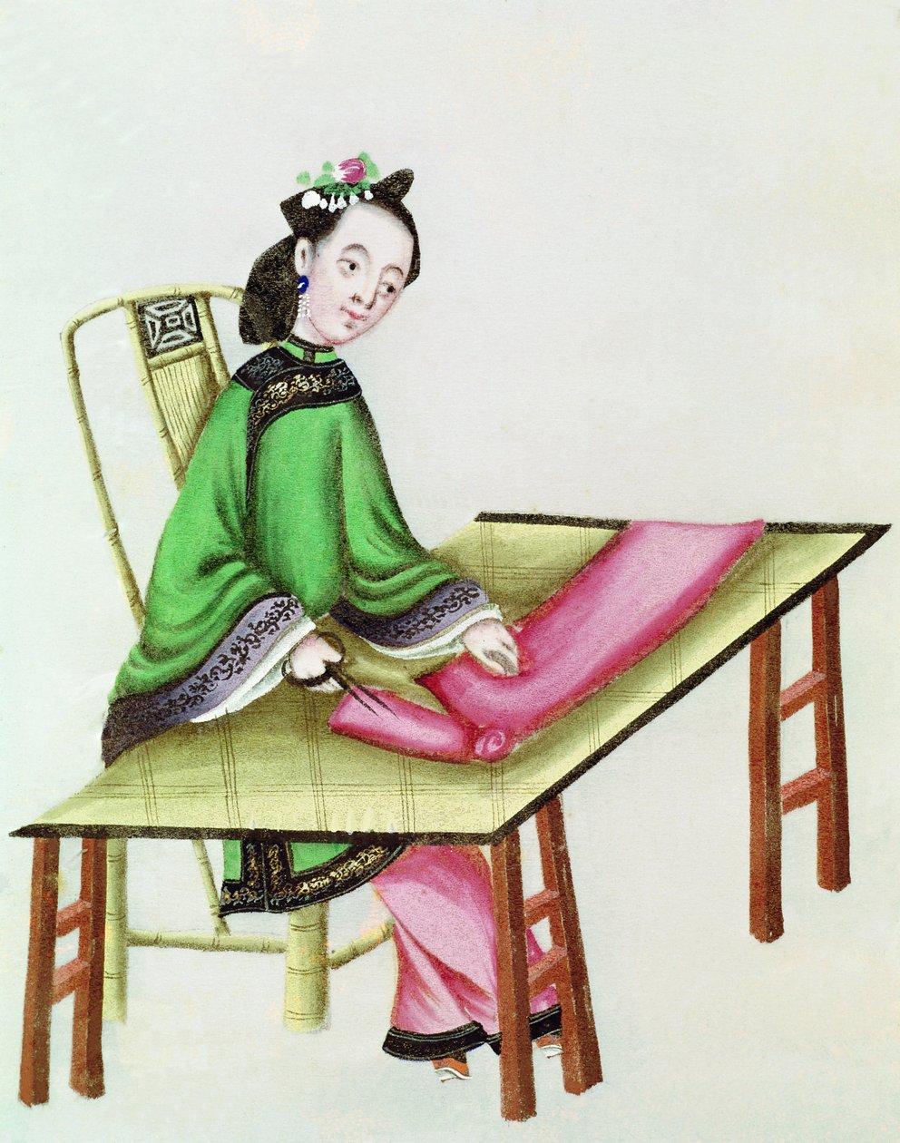 Egy kínai nő kendőt vágó, Qianlong-korszak (1736-96) alkotó: Chinese School