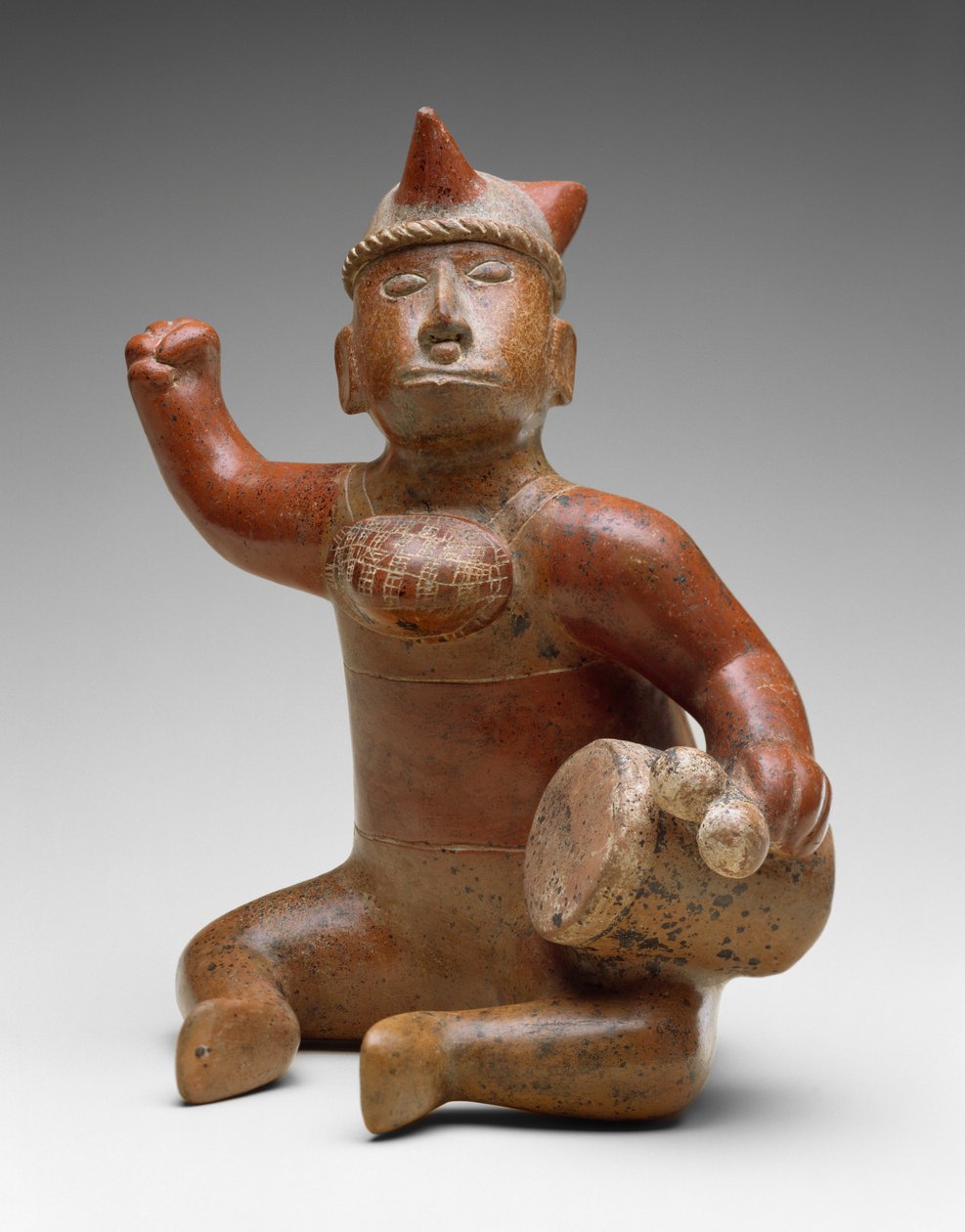 Ülő zenész, Mexikó, Kr.e. 100-i.sz. 300 (kerámia bikróm festéssel) alkotó: Colima Culture