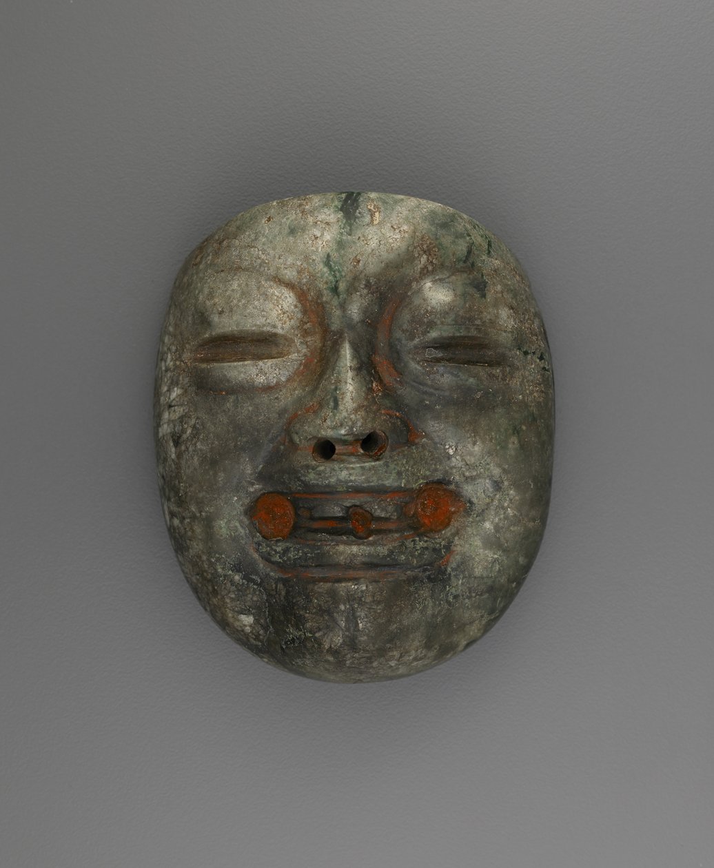 Medál maszk formájában alkotó: Culture Olmec