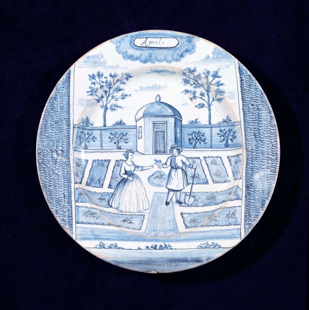 Delftware tányér április hónapot ábrázolva (ónmázas cserépedény) alkotó: Dutch School