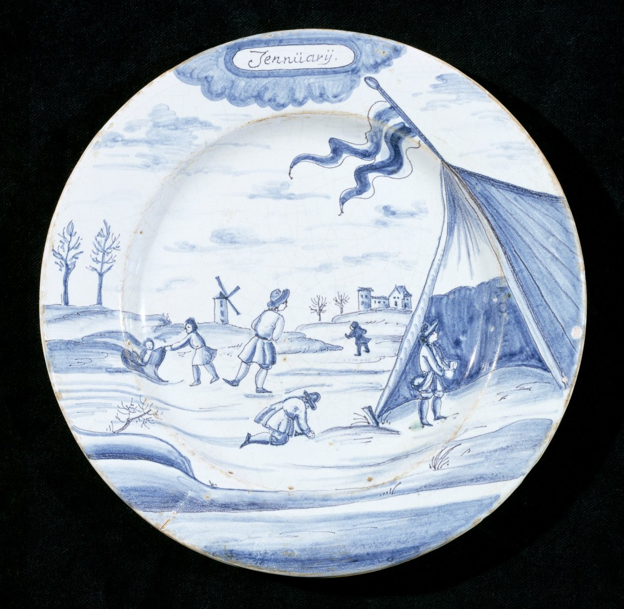 Delftware tányér január hónapot ábrázolva (ónmázas cserépedény) alkotó: Dutch School