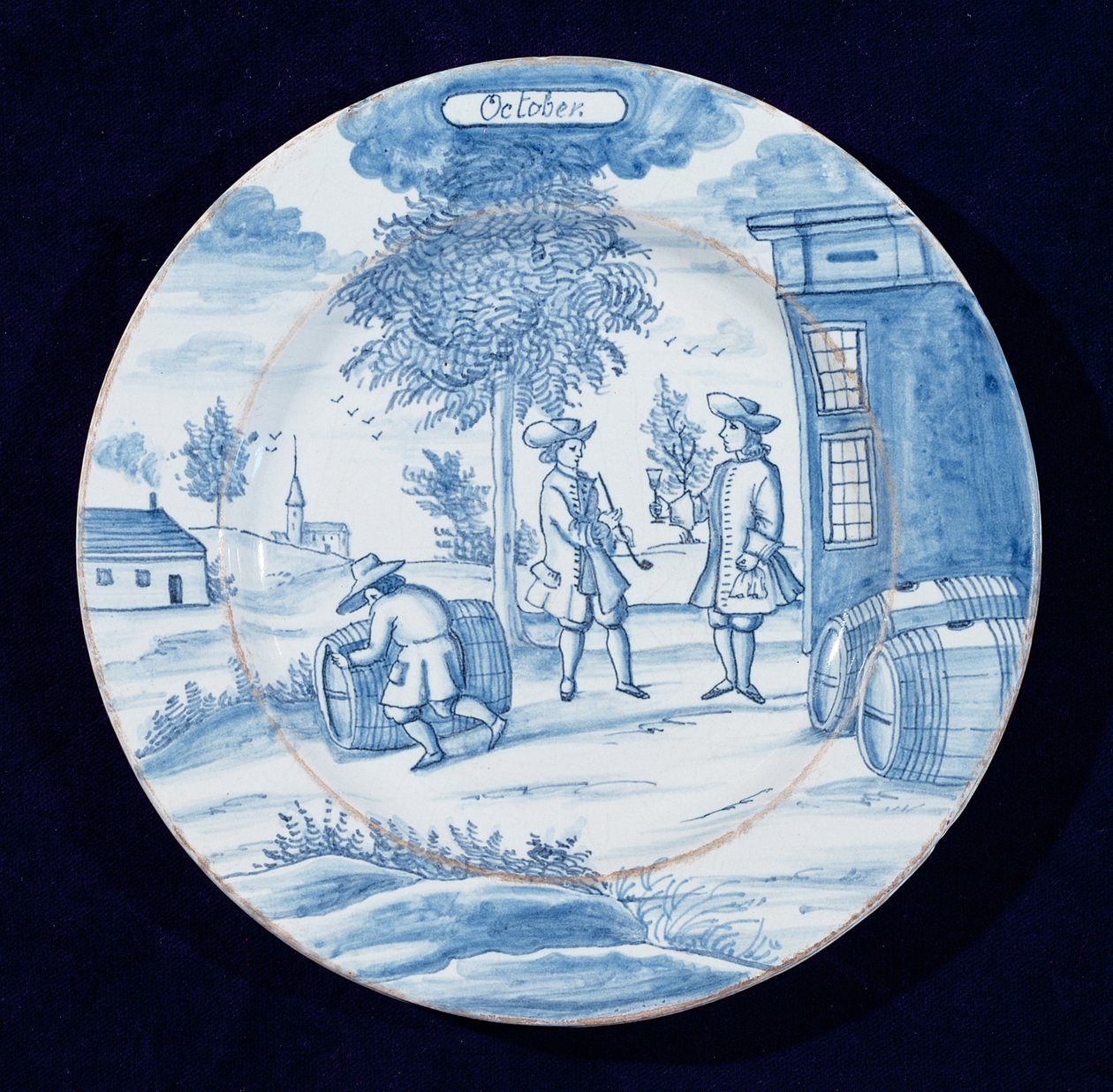 Delftware tányér október hónapot ábrázolva (ónmázas cserépedény) alkotó: Dutch School