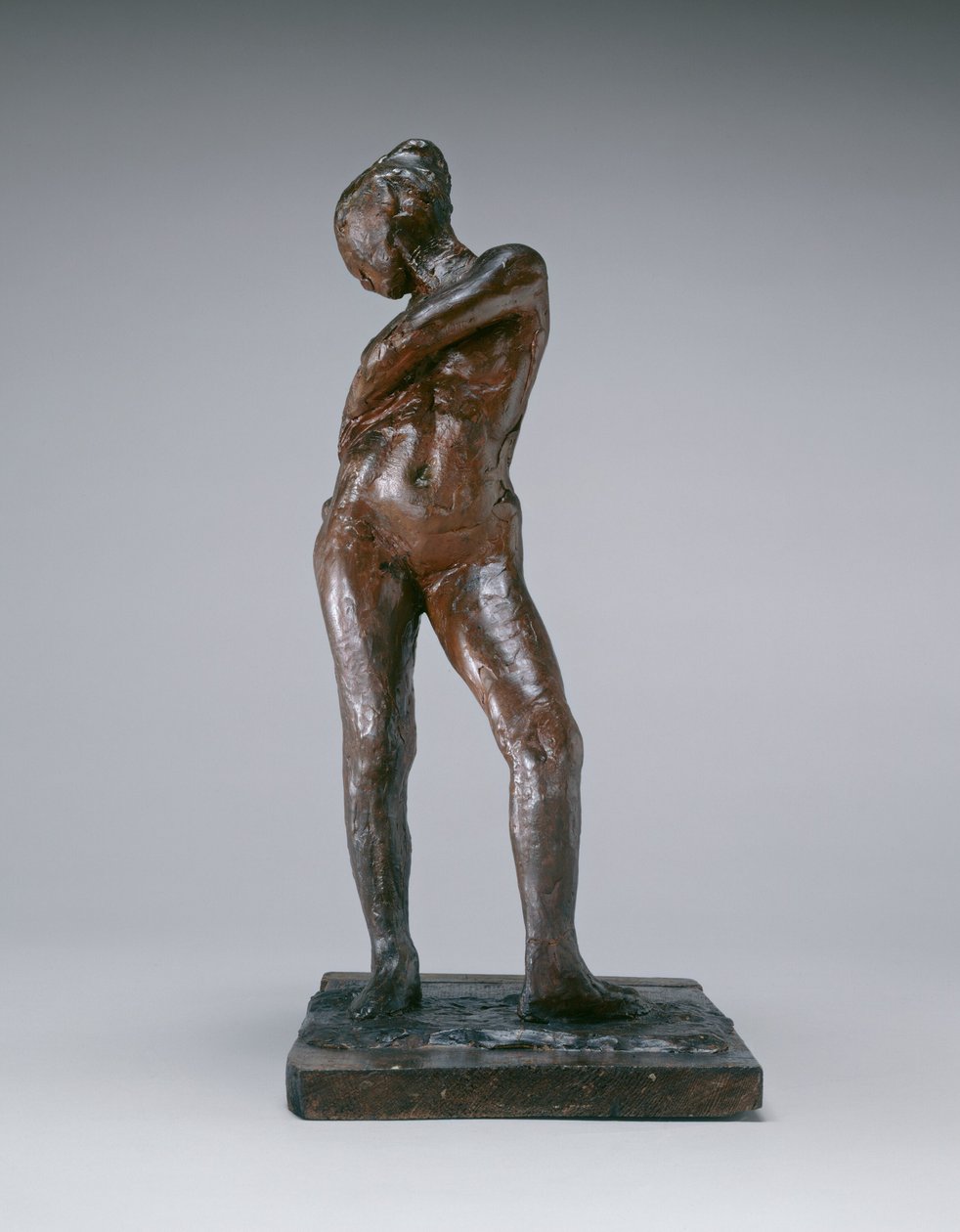 Táncosnő a harisnya zsinórját rögzítve, c. 18851890. alkotó: Edgar Degas