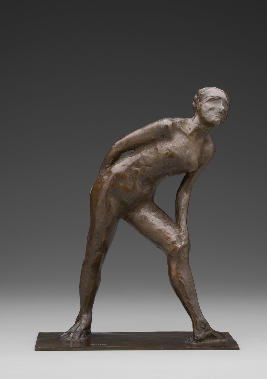 Táncosnő a térdét dörzsölve, a Harlekin szerepében táncolóként ismert (bronz) alkotó: Edgar Degas