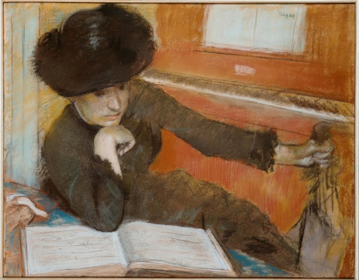 Nő ül egy zongora előtt alkotó: Edgar Degas