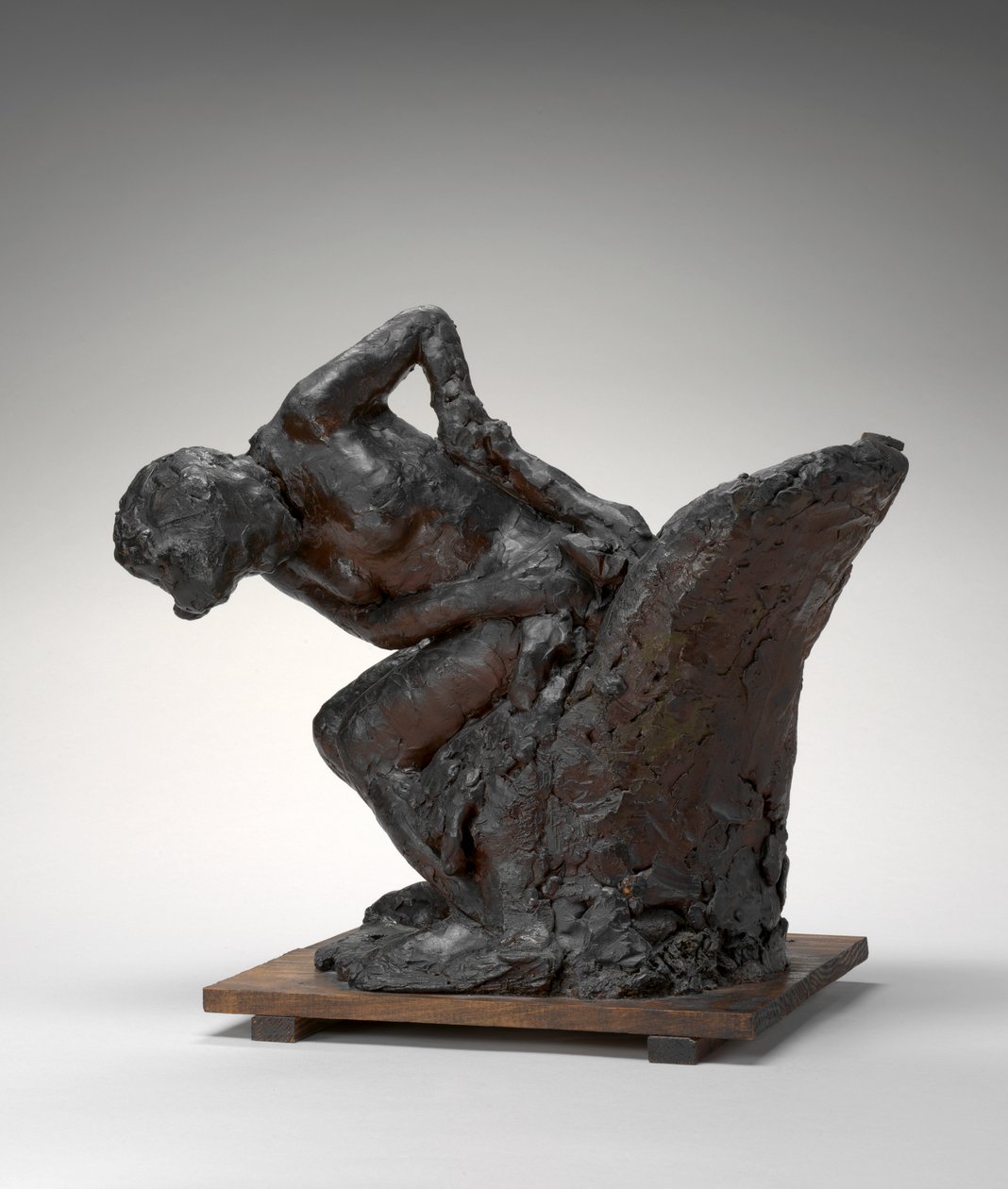 Nő ül, megtörli a bal csípőjét alkotó: Edgar Degas