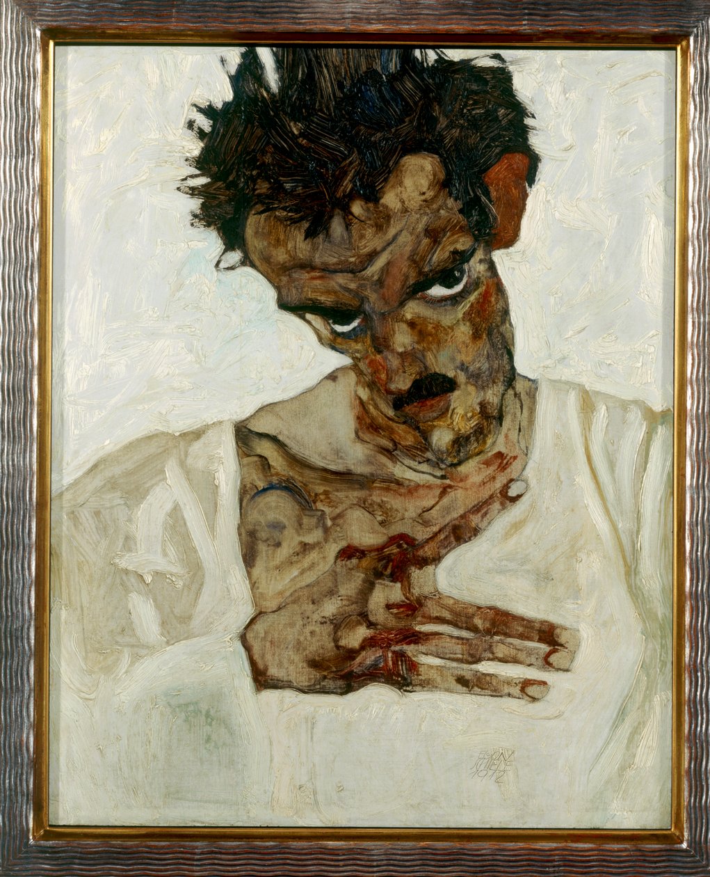 Önarckép lehajtott fejjel alkotó: Egon Schiele