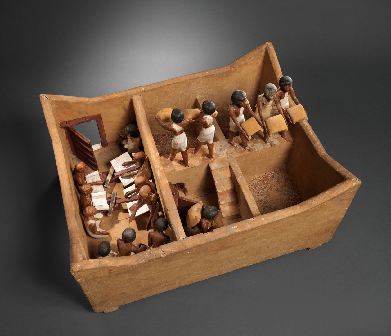 Egy magtár modellje írástudókkal Meketre sírjából, i. e. 1981–1975. (fa, gipsz, festék, len, gabona) alkotó: Egyptian 12th Dynasty