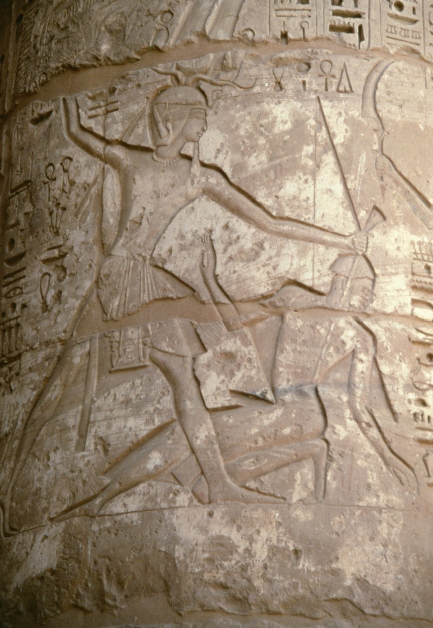 Ramszesz a hajuknál fogva tartja ázsiai ellenségeit, miközben készül megölni őket, dombormű, I. Szeti temploma, Kanaisz, Egyiptom, Egyiptomi civilizáció, Újbirodalom, XIX. dinasztia (fotó) alkotó: Egyptian 19th Dynasty