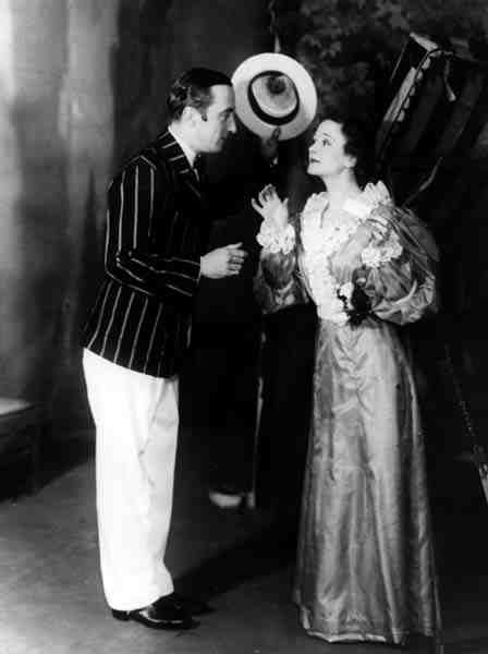 George Curzon Algernon Moncrieffe (Algy) és Ursula Jeans Cecily Cardew szerepében Oscar Wilde (1854-1900) Az őszinteség fontosságában az Old Vic Színházban, 1934. február 5. (f/w fotó) alkotó: English Photographer
