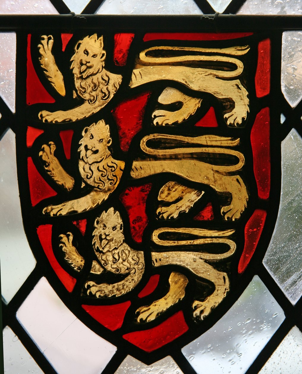 Anglia címerét ábrázoló ablakkolostorok alkotó: English School