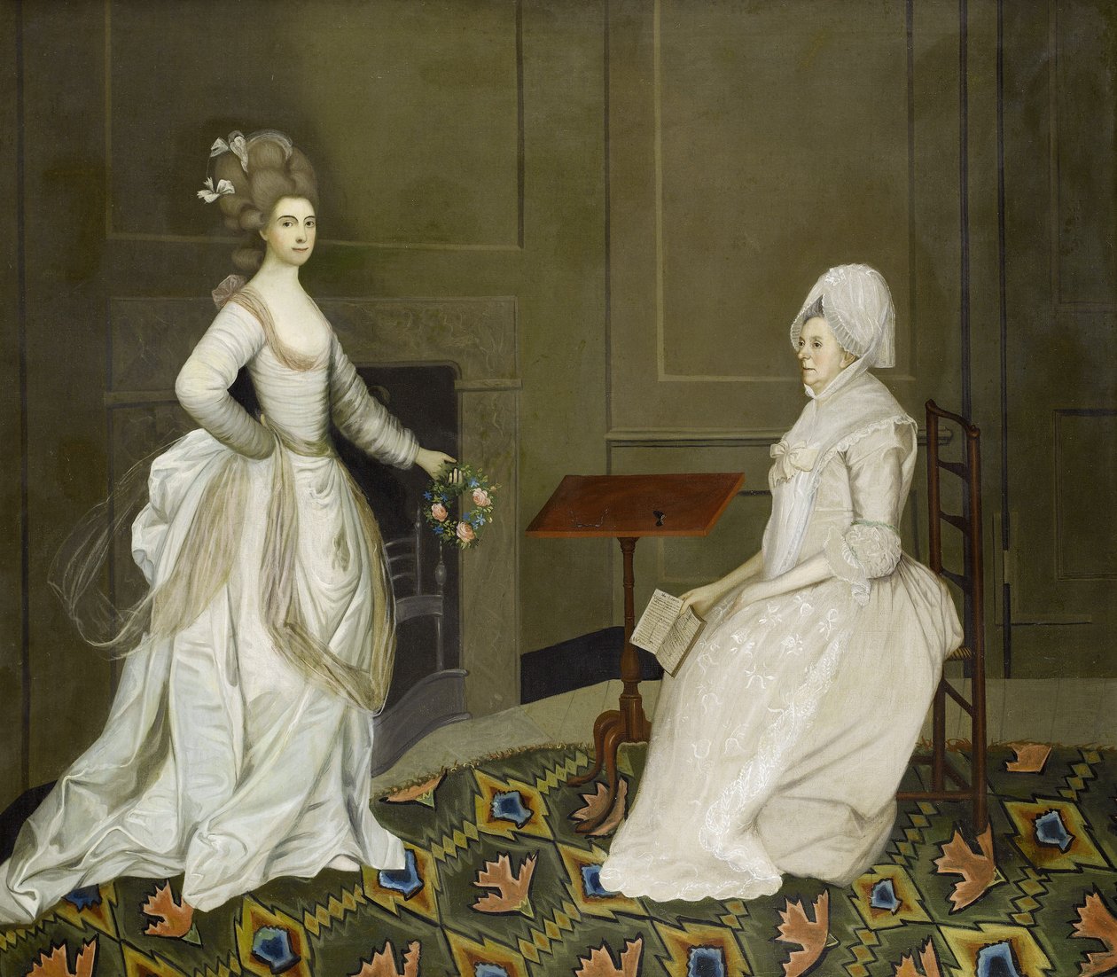 Két hölgy egy belső térben, az egyik olvas, a másik kezében virágfüzér alkotó: English School, 18th Century