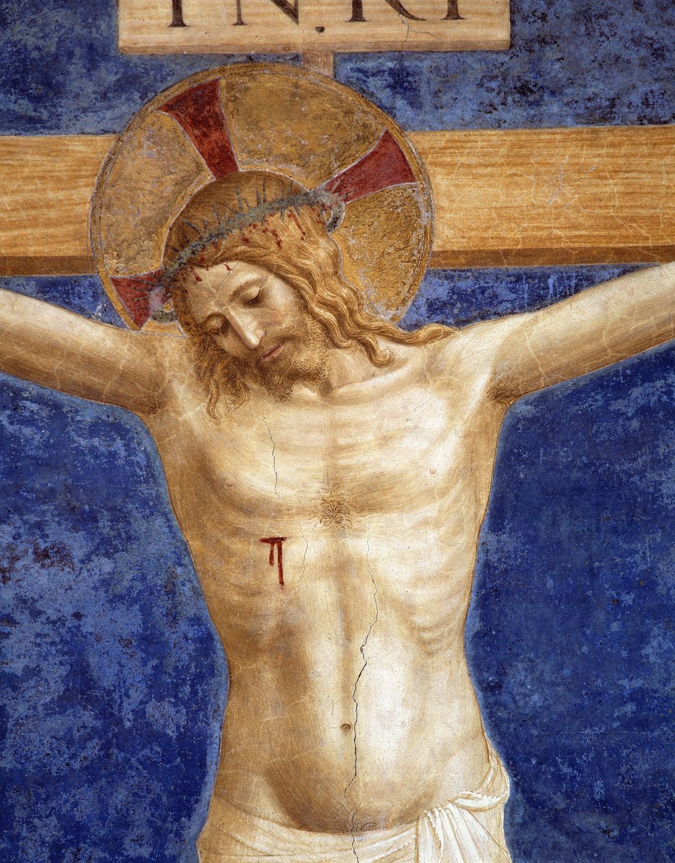 keresztre feszített Krisztus. A kereszten "INRI" felirat, részlet alkotó: Fra Angelico