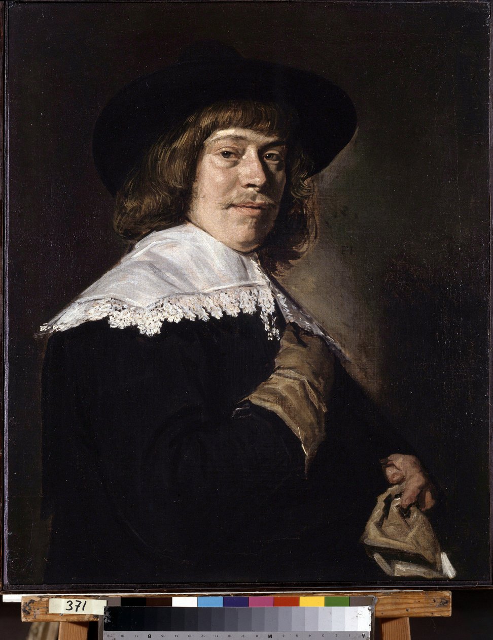 Egy kesztyűt tartó férfi portréja. Egy kesztyűt tartó fiatalember portréja. I. Frans Hans Hals (1581-1666) festménye, 1650 körül. Olaj, vászon. Holland művészet, barokk stílus. Ermitázs Múzeum, Szentpétervár. alkotó: Frans Hals