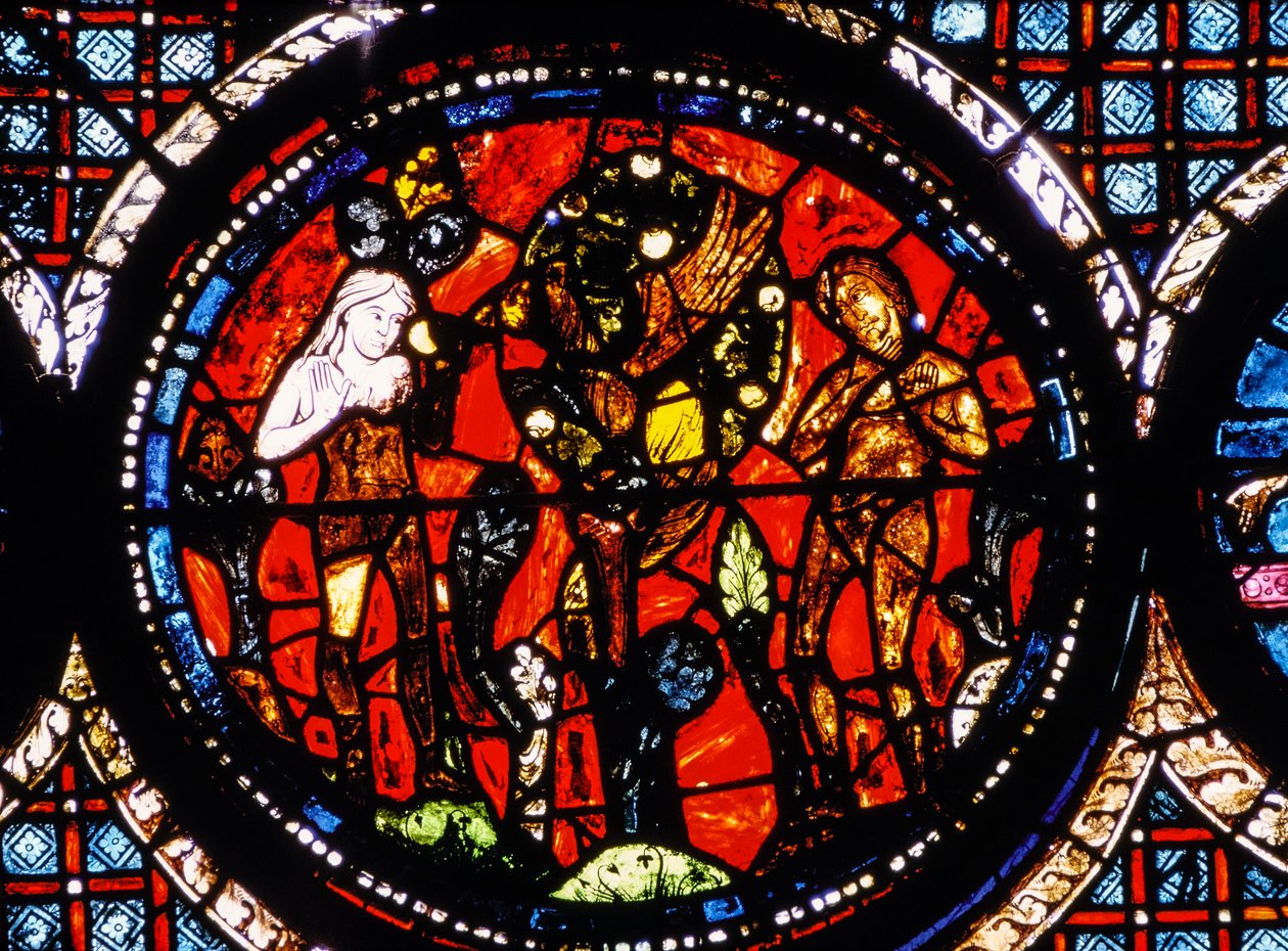 Chartres-i katedrális, festett üvegablak, amely a kör alakú irgalmas szamaritánust ábrázolja Festett üvegablak (festett üveg) alkotó: French School