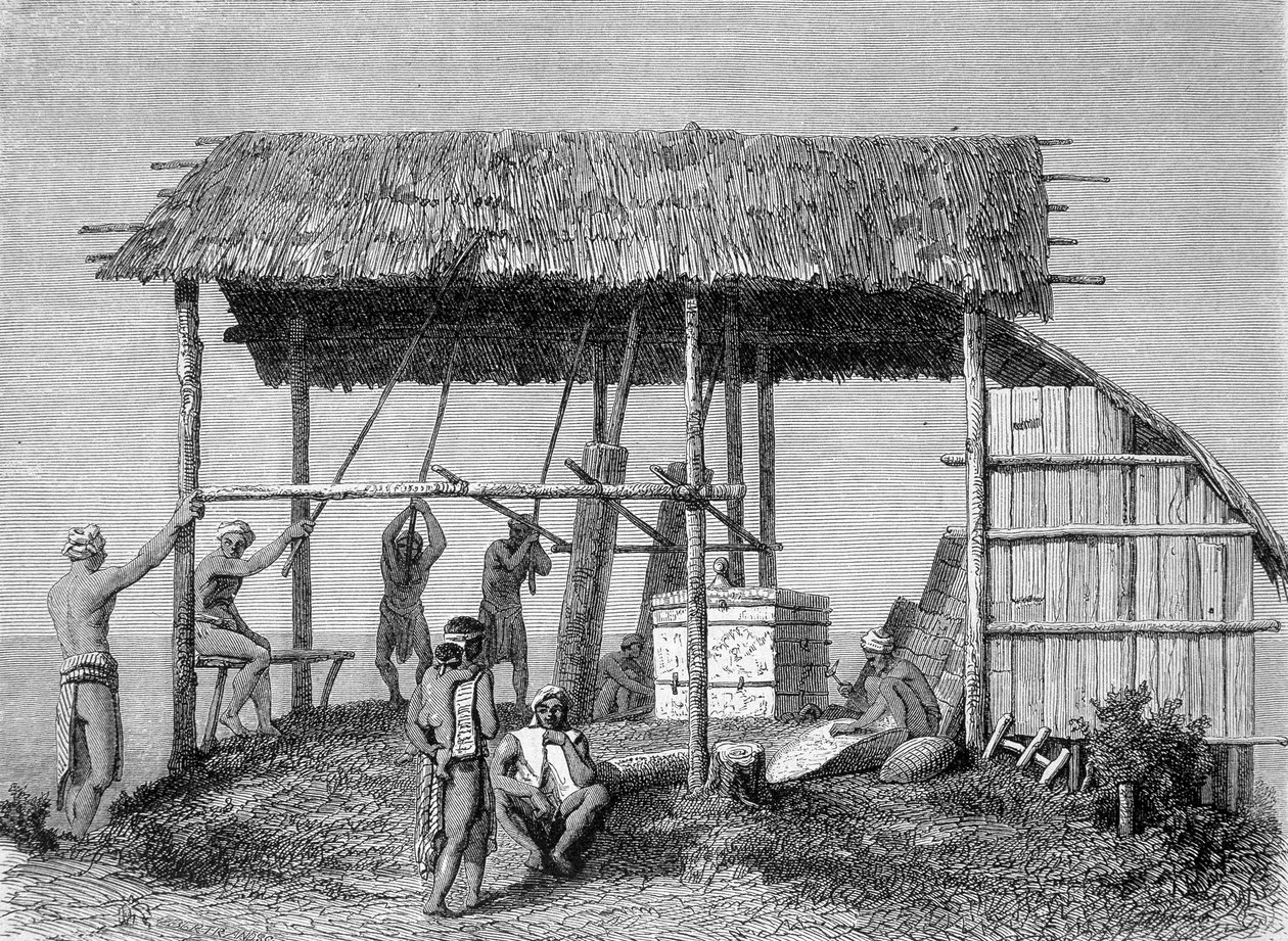 A „Le Tour du monde” 1862-es kiadásában megjelent illusztráció, amely egy kovácsot ábrázol a dayakokban Borneo szigetén. Metszés. alkotó: French School