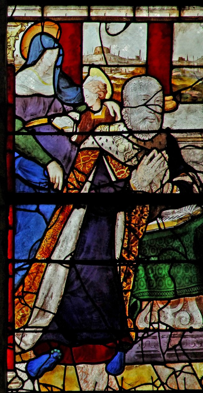 A w13-as ablak Anne de Montmorencyt ábrázolja Szent Annával, aki olvasni tanítja a Szűzanyát alkotó: French School