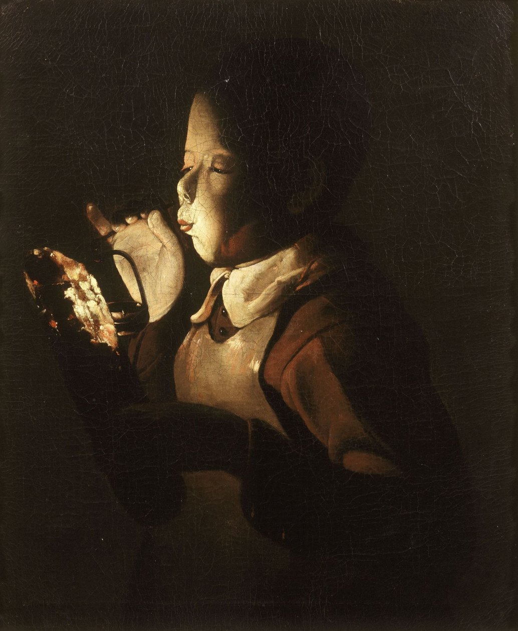 Fiú fúj a lámpánál alkotó: Georges de La Tour