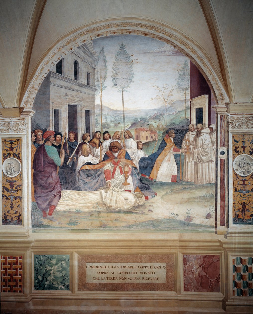 Szent Benedek Krisztus testét hordozza annak a szerzetesnek a testén, akit a föld nem hajlandó eltemetni Antonio Bazzi dit il Sodoma (1477 - 1549) által készített, Nursie-i Szent Benedek (480 - 567) alapítójának életéről szóló freskója. a Benedi Rend alkotó: Giovanni Antonio Bazzi Sodoma