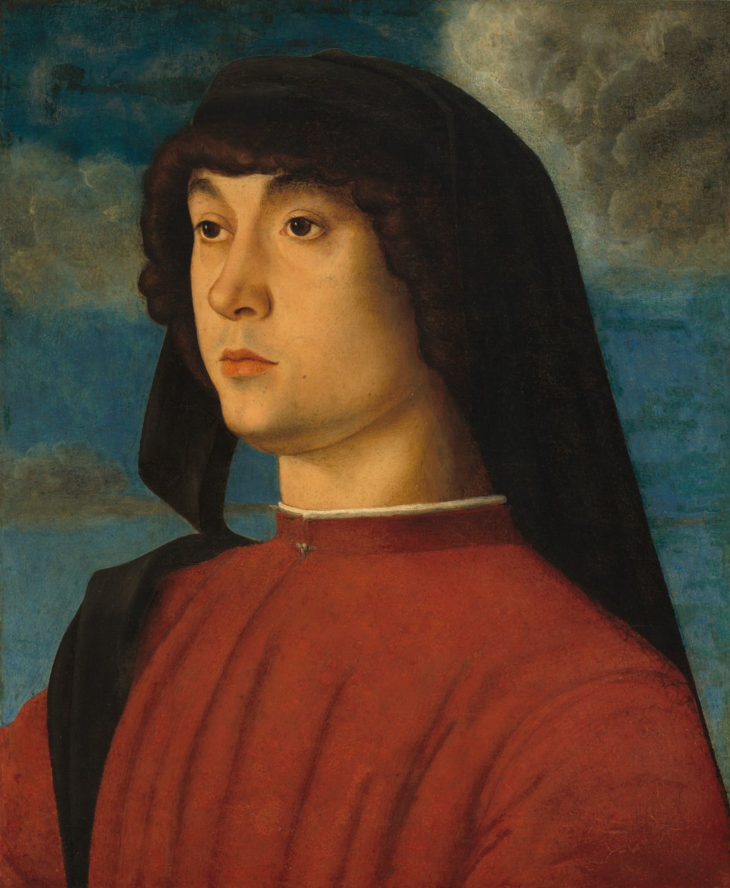 Egy vörös ruhás fiatalember portréja alkotó: Giovanni Bellini