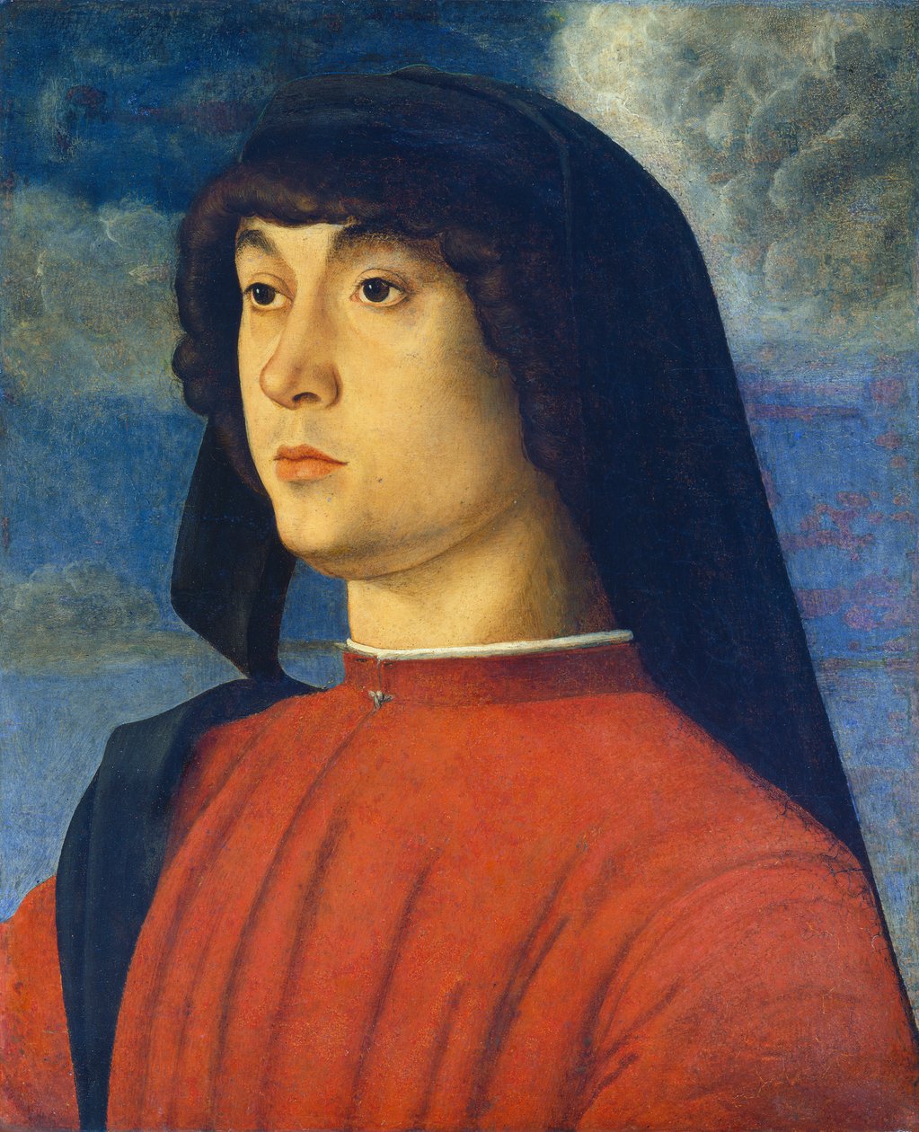 Egy fiatalember portréja vörösben alkotó: Giovanni Bellini