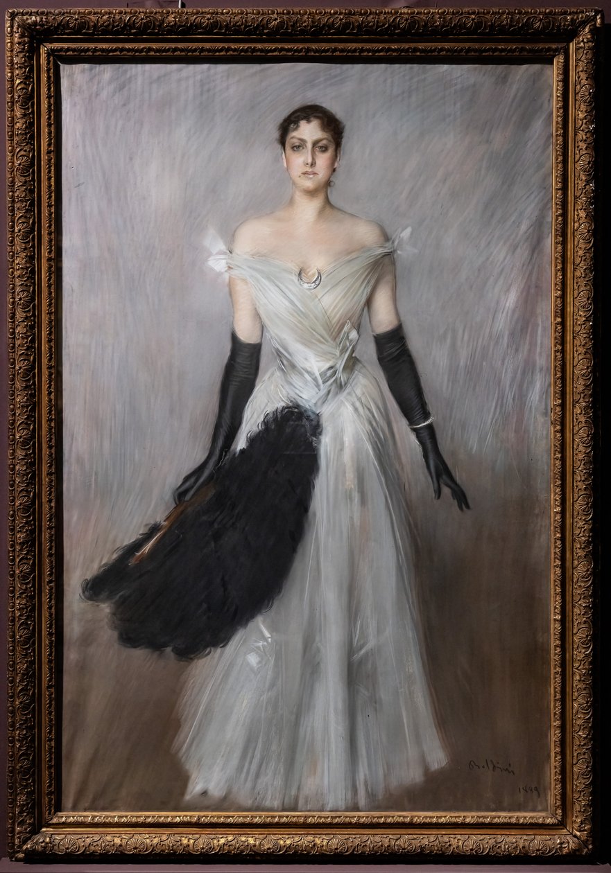 Fehér ruhás hölgy portréja, kesztyűvel és legyezővel alkotó: Giovanni Boldini