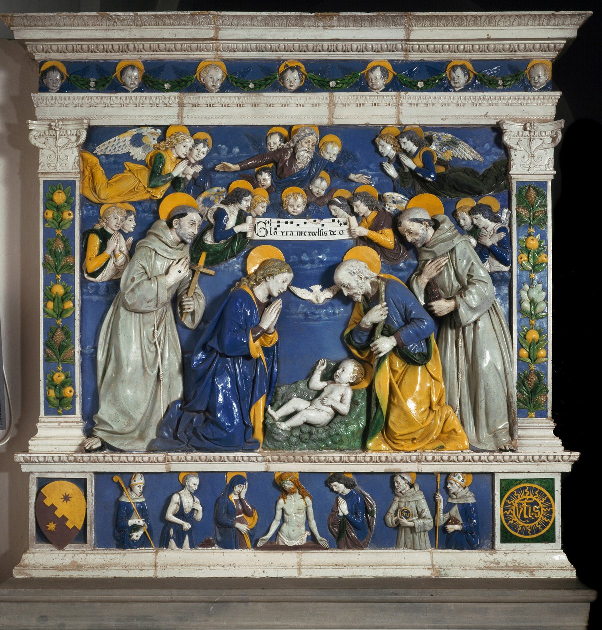 Születés Assisi Szent Ferenccel és Páduai Szent Antalnal (san antonio di padova) A Szentháromság ábrázolása Istennel, Jézus Krisztussal és a Szentlélek galambjával. Giovanni della Robbia (1469-1529) nagy domborműves kerámiája 1485 körül Dim alkotó: Giovanni della Robbia