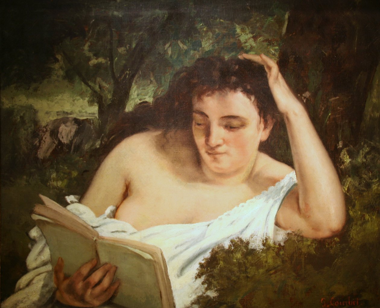Egy fiatal nő olvas alkotó: Gustave Courbet