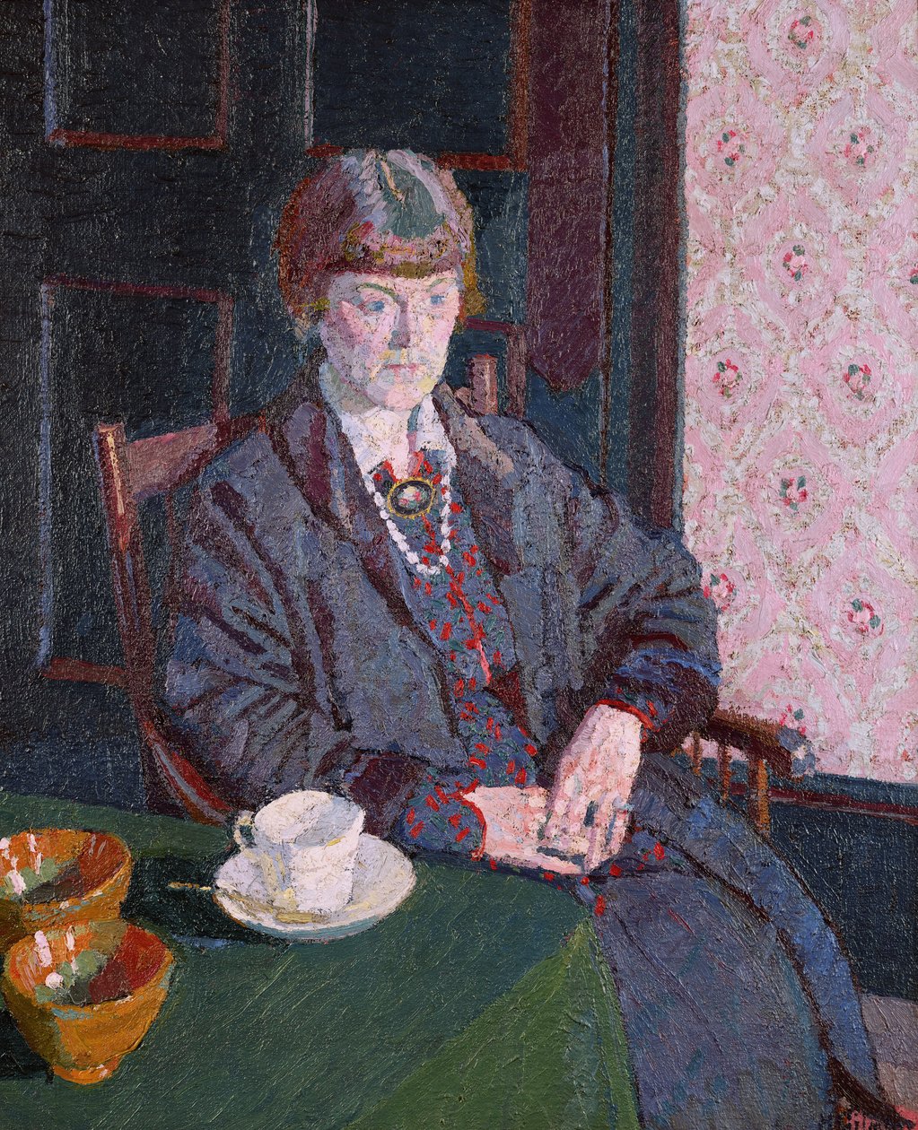 Nő ül egy asztalnál alkotó: Harold Gilman