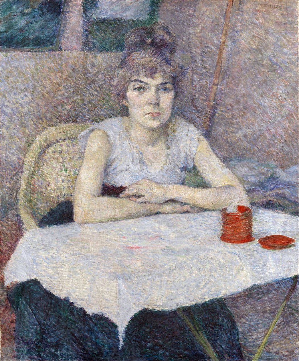 Fiatal nő egy asztalnál alkotó: Henri de Toulouse Lautrec