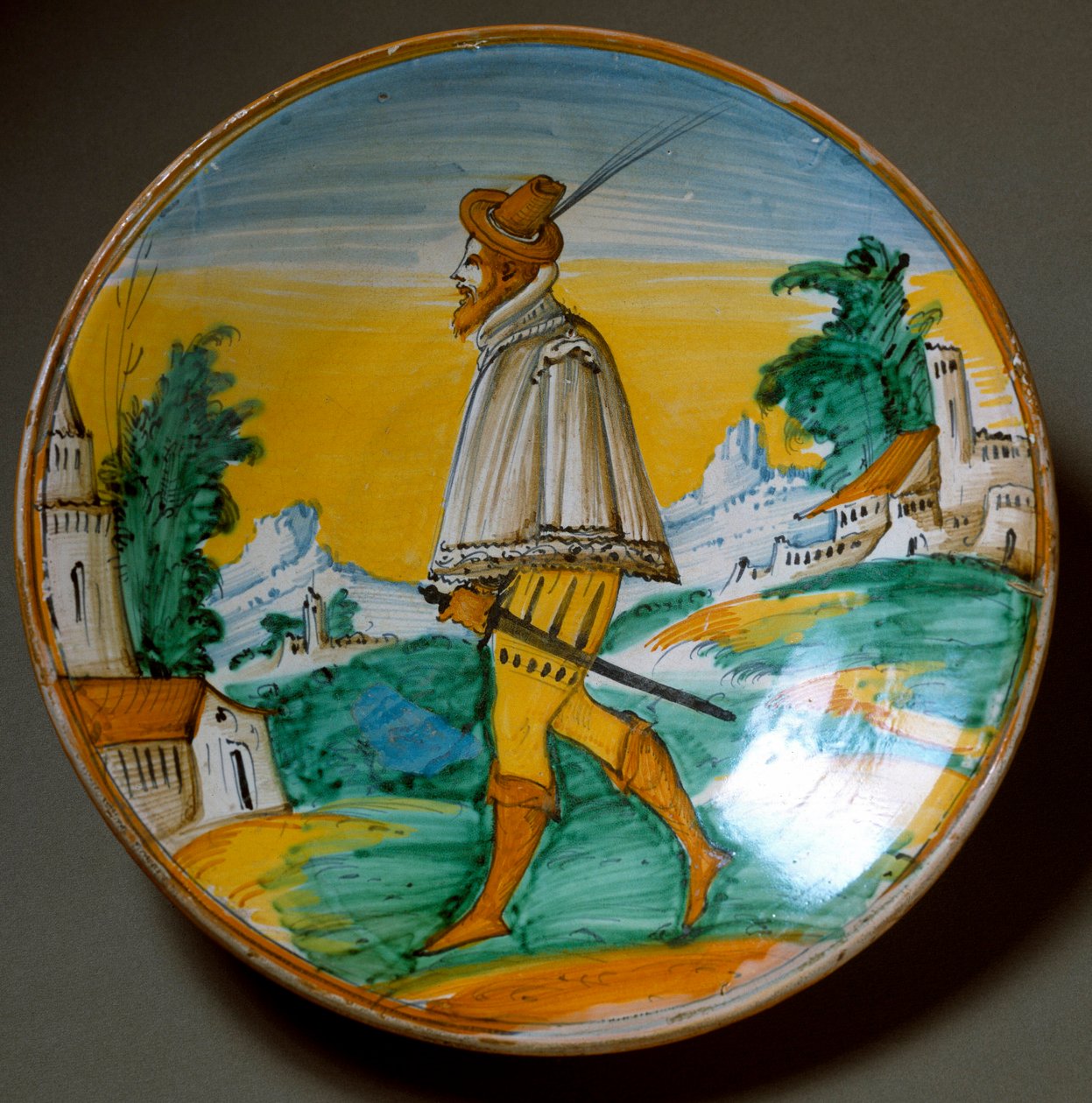 Fiatal fegyveres férfi. Az olaszországi Viterbóban gyártott kerámialemez. 16. század vége Firenze, Museo Nazionale del Bargello alkotó: Italian School