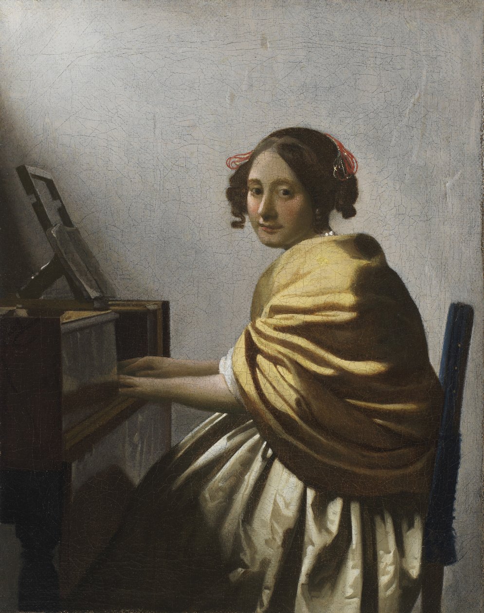 Egy fiatal nő egy Virginalban ül, c. 1670 alkotó: Jan Vermeer van Delft
