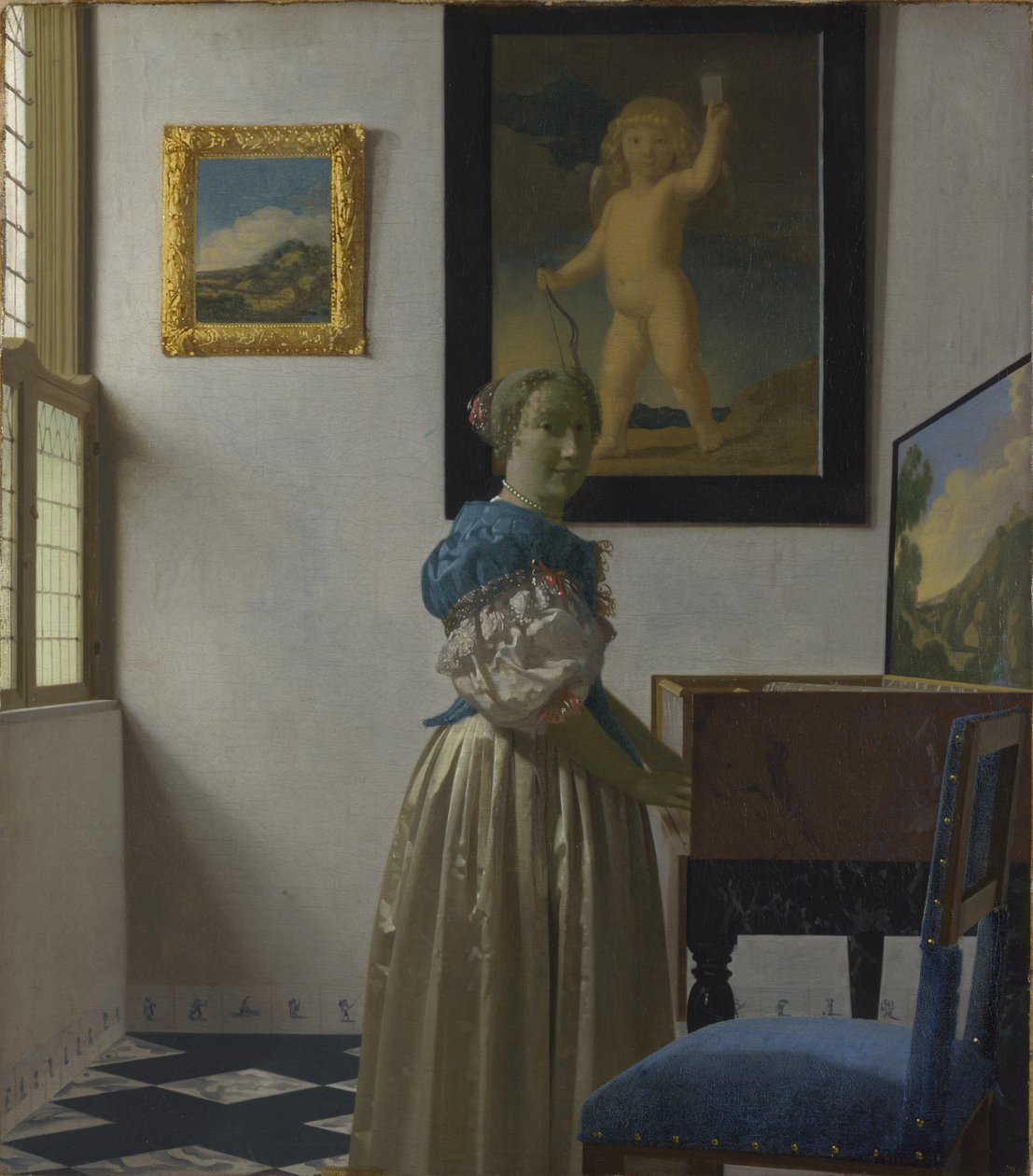 Egy fiatal nő áll egy Szűzanya mellett alkotó: Johannes Vermeer