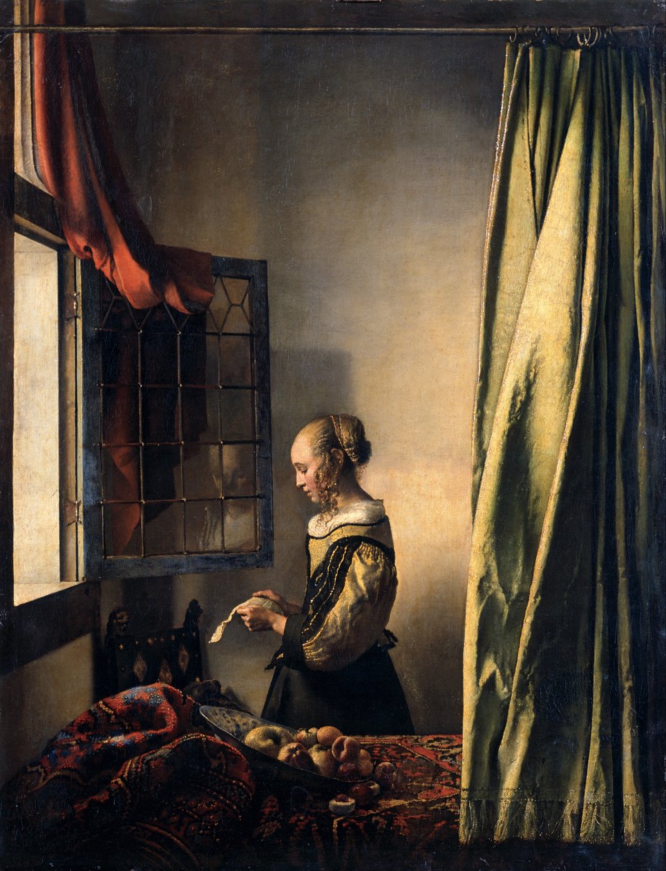Mädchen, das einen Brief am offenen Fenster liest alkotó: Johannes Vermeer