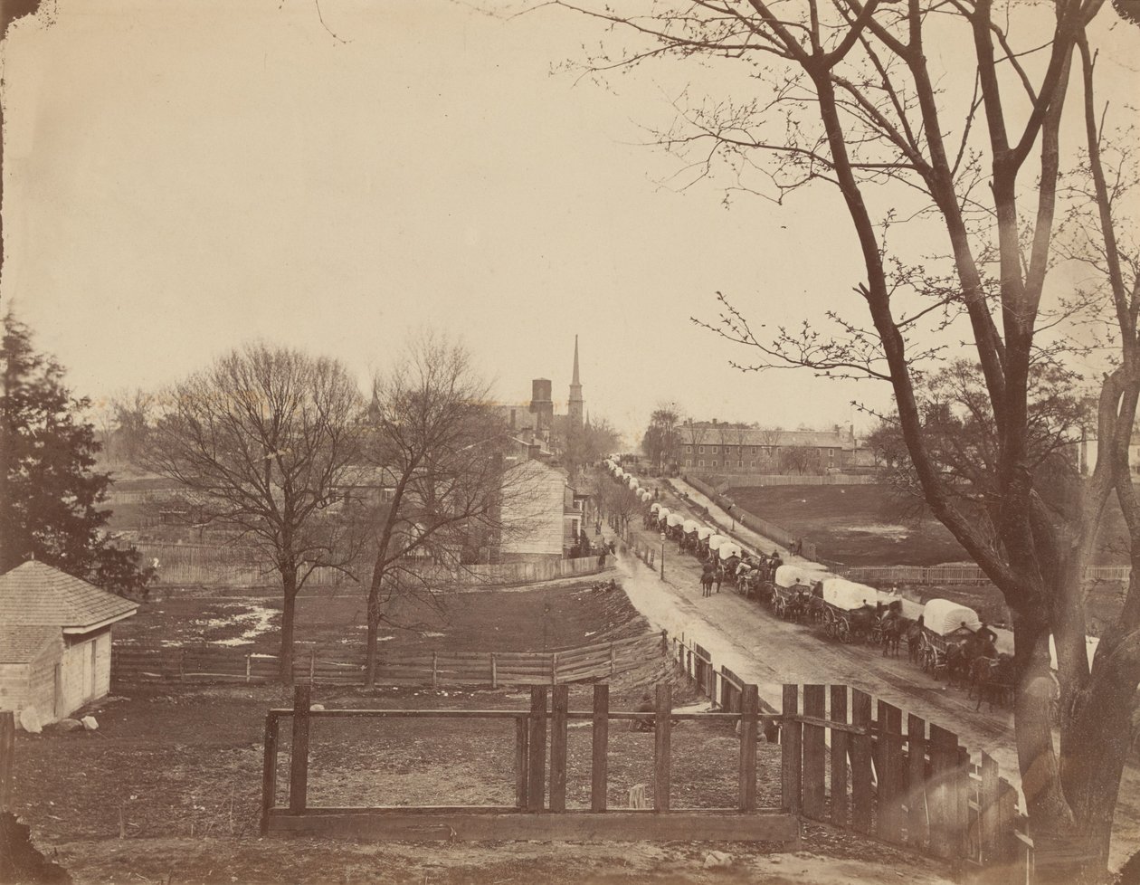 Katonai vagonok vonata belépve Petersburgba, Virginia, 1865. április. alkotó: John Reekie