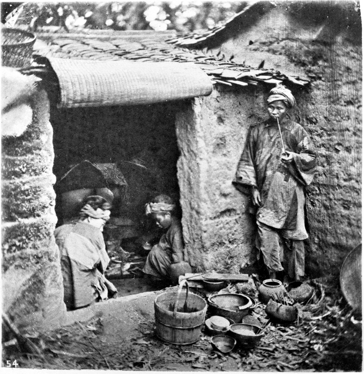 Kína, egy egyszerű család, 1870 körül (fotó) alkotó: John Thomson