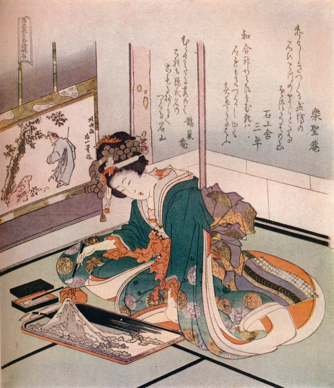 Egy nő a Fuji-hegy miniatűr modelljét készíti, c1823. alkotó: Katsushika Hokusai