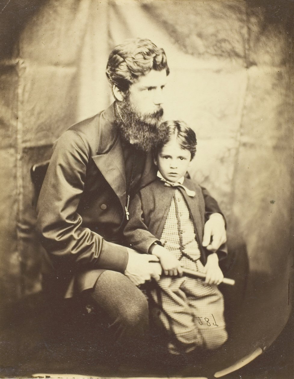 James Langton Clark tiszteletes és fia, Charles Robin, 1864. alkotó: Lewis Carroll